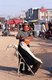 China: Outdoor barber, Old Kuqa, Xinjiang Province